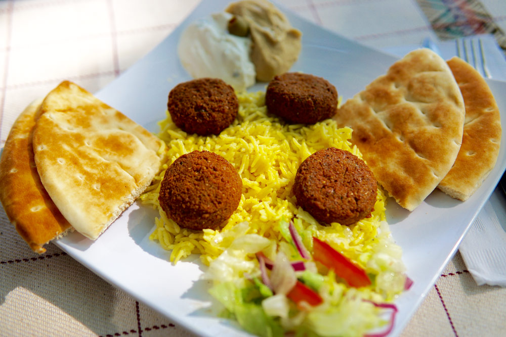 A plate of crispy Falafel with Seasoned Rice at Habesha Cafe.