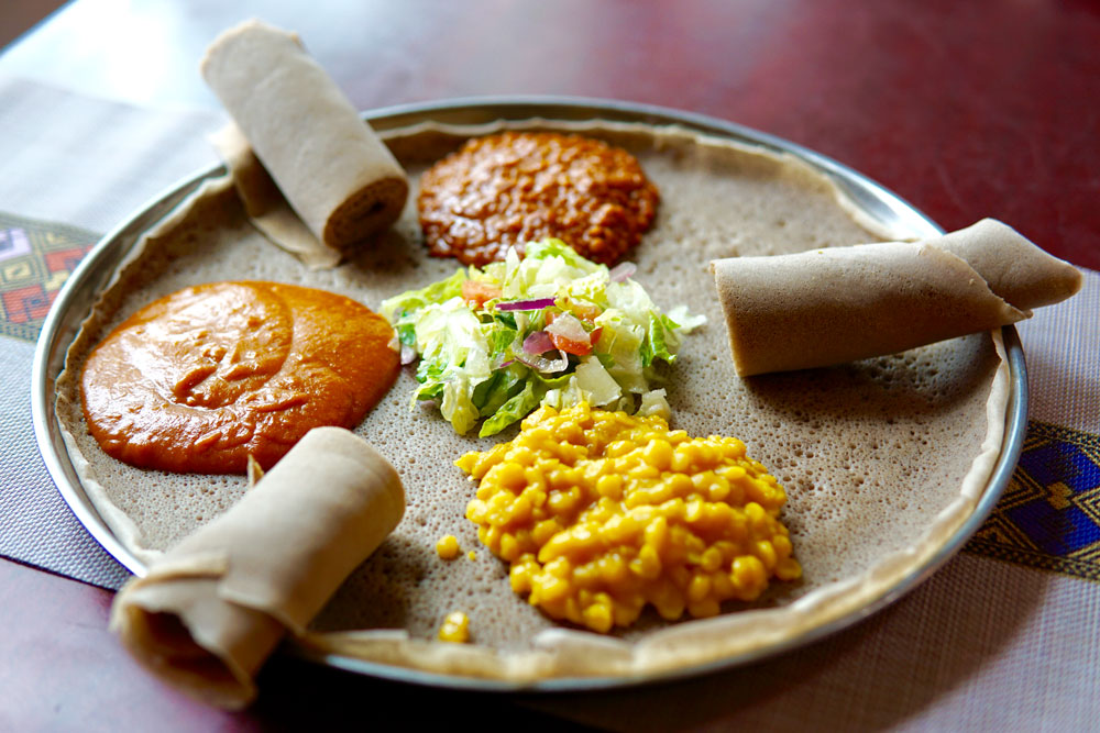 A vibrant platter of the Matti Vegan Combo at Habesha Cafe.