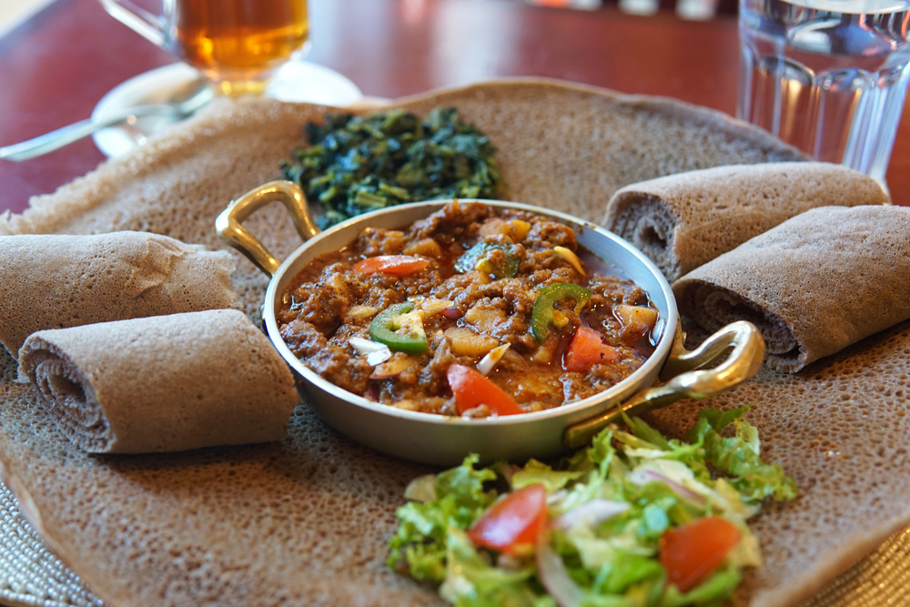Sizzling Vegan Beyond Beef Tibs at Habesha Cafe.
